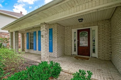 Front entry with brick front porch.