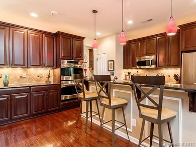 Kitchen has ample upgraded cabinetry, double wall 