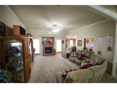 Living Room. Large living area with gas log fireplace.