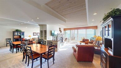Dining area between kitchen and living room with L