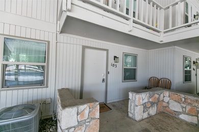 Property entrance with central air condition unit