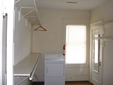 Upper Walk In Closet has dryer