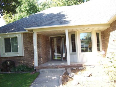 Covered front wrap around porch