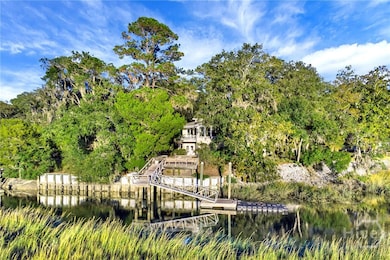 dock is just a short distance from the house with deck, floating dock and jet dock. Sea wall to prevent erosion