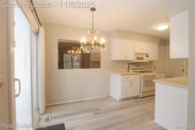 2110 Hidden Meadows Dr unit A, Walled Lake, MI 48390 - photo 6