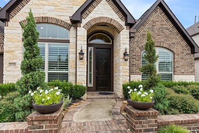 Stunning 1-story home with brick & stone elevation
