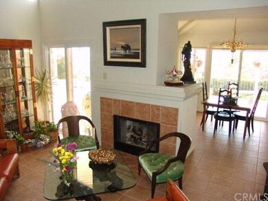 Living Room opens to Formal Dining Room.