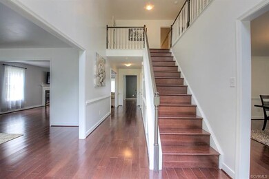 2-Story Foyer with Hardwood Staircase
