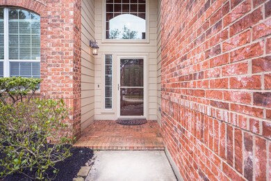 Front porch is pushed back for added privacy.