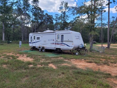 This camper stays with the home!