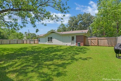 This pretty yard is a wonderful spot for family ga