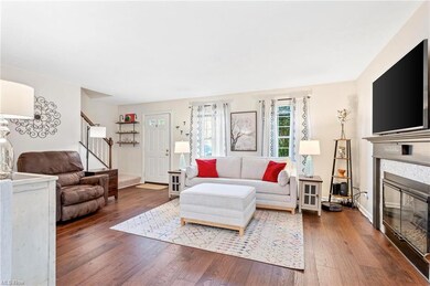Hardwood floored living room featuring engineered 