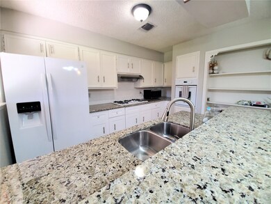 RECENT GRANITE AND LOWER SHAKER CABINETS