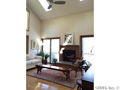 Great Room gas fireplace, double sliders to deck