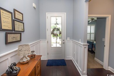 Entryway featuring dark hardwood / wood-style floo