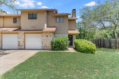 Townhome / multi-family property with stone sidin