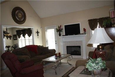Cozy living room with fireplace.