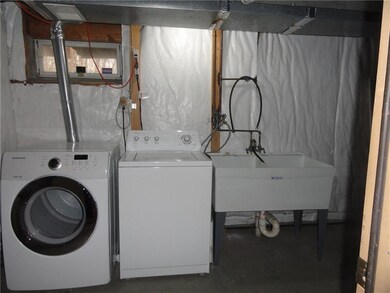 Washer and dryer plus double utility sink.