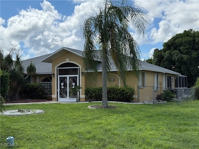 Ranch-style house with stucco siding and roof with shingles