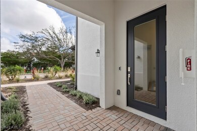 16889 Fairgrove Way unit 5-201, Naples, FL 34110 - photo 2