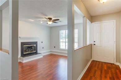 From the front door, the entry brings you to the sunken living room.