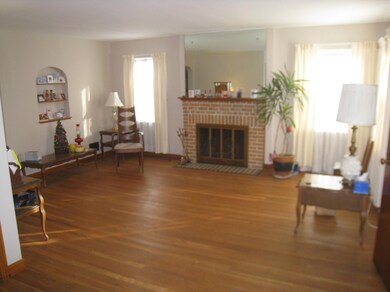 Living Room w/ log burning fireplace