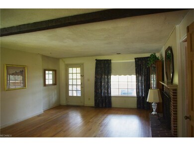 Livingroom is 17 x 15.  Hardwood floors.  Door goe