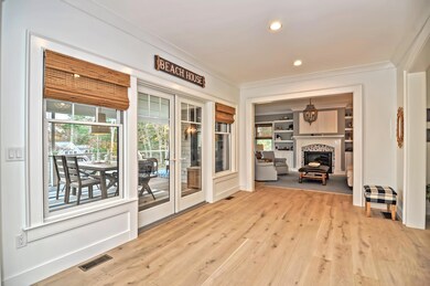 Foyer opens to living room