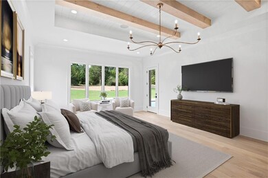 Main Level Owners Suite is vaulted