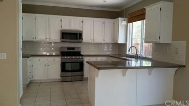 Kitchen with stainless steel appliances