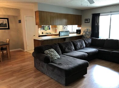 Kitchen opens to living room