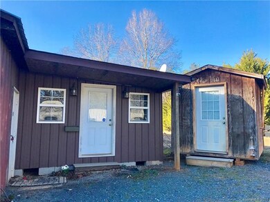To the left is an office area enclosed workroom.  