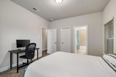 First level bedroom with en-suite bathroom and wal