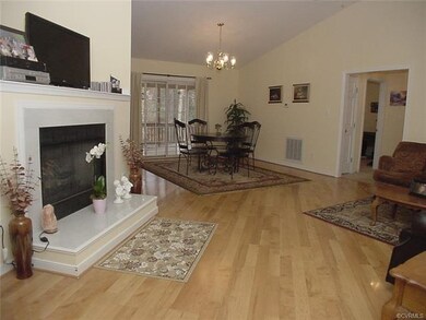 Open floor plan w/ vaulted ceiling