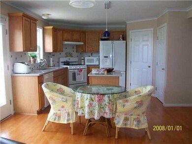 Kitchen Eat in Kitchen with Corian countertops and