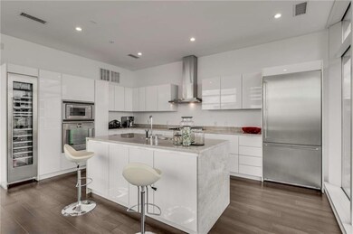 European kitchen features all stainless Gaggeneau 