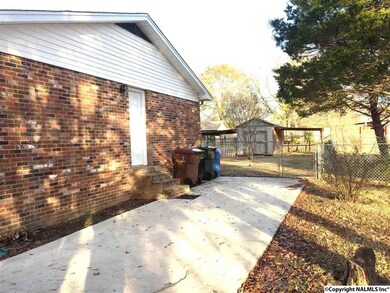 EXTRA PARKING, FENCED YARD, STORAGE BLDG