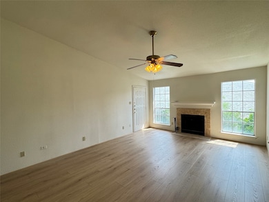 Reverse view of living room with plenty of natural