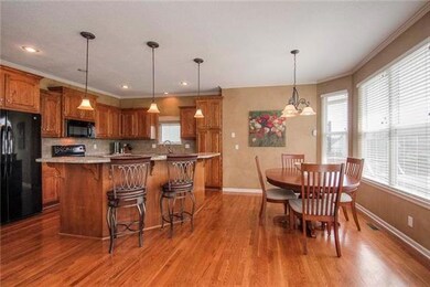 Open Kitchen with Island and Granite on All Counte