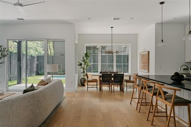 Living room featuring light wood-type flooring an