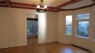Enjoy the stately coffered ceilings in the spaciou