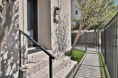 Turfed side yard with gated entry.