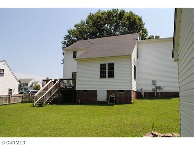 Exterior Back - Rear deck, fenced rear yard.
