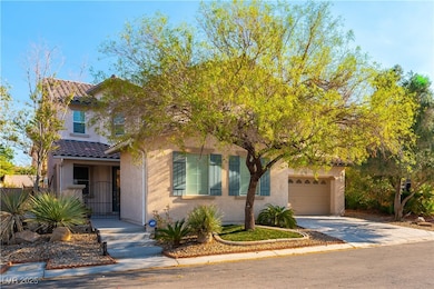 View of front facade featuring concrete driveway,