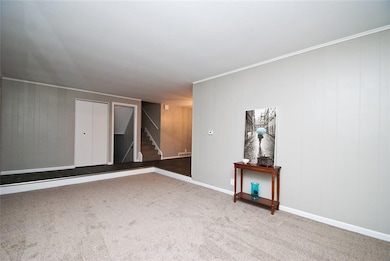 Living room - new carpet, fresh paint.