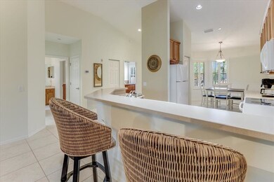 Counter, kitchen, front entry view and entry to 2n