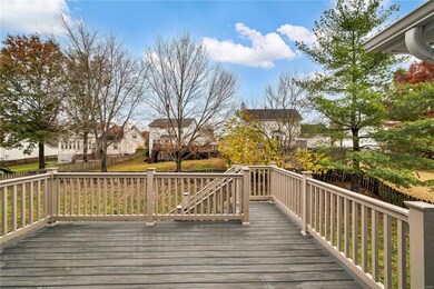 Low maintenance deck overlooking fenced back yard