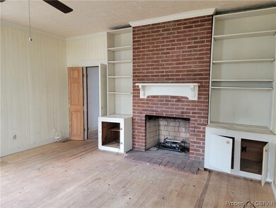Unfurnished living room with light wood-type floor