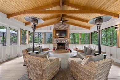 Gorgeous screened porch with firepace!