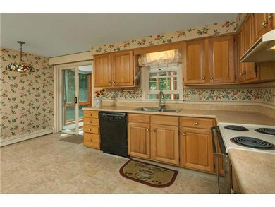 Kitchen. The kitchen opens to a sun...